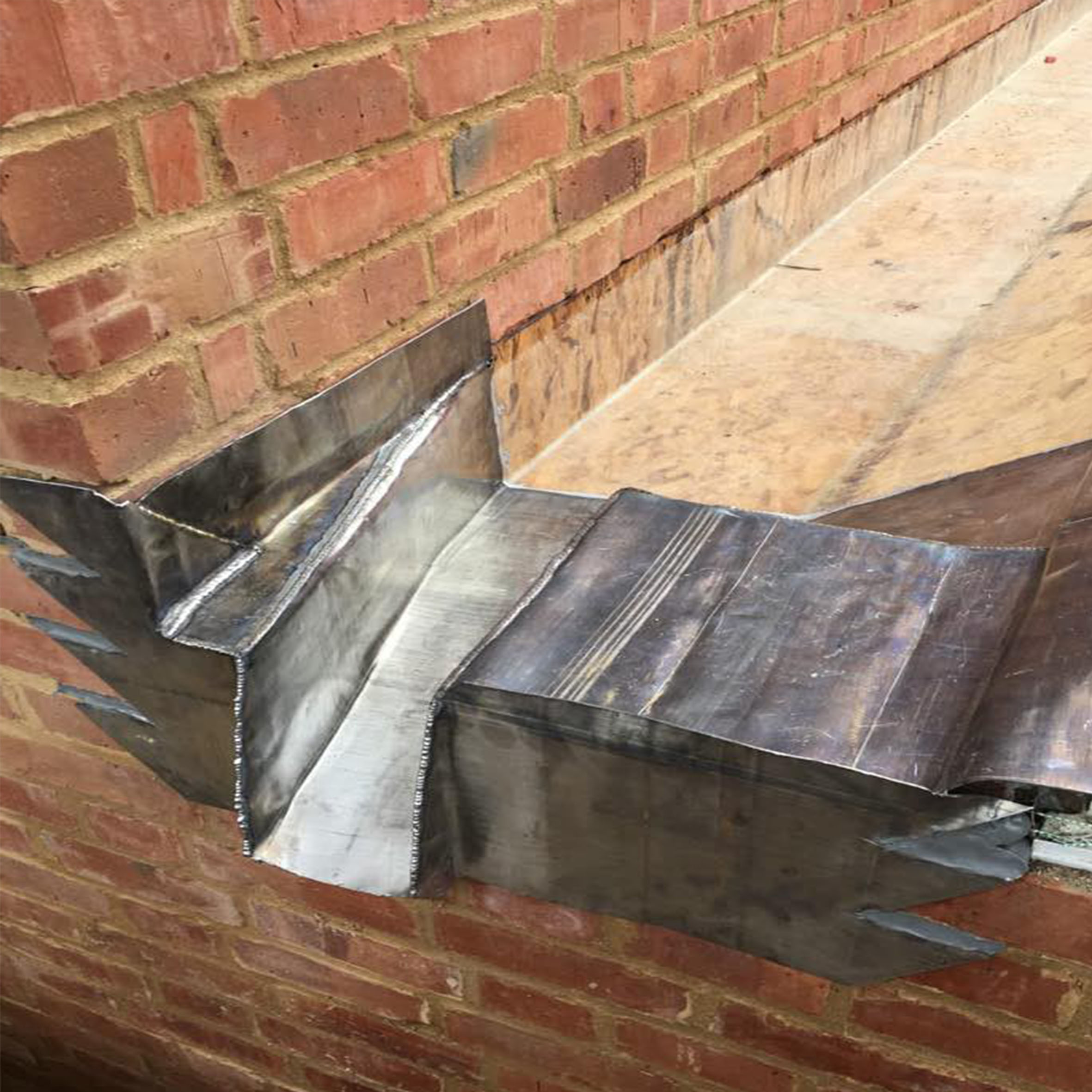 Lead and roofing flashings